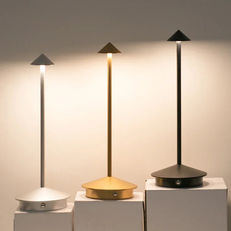Spire lamps in silver, gold and black