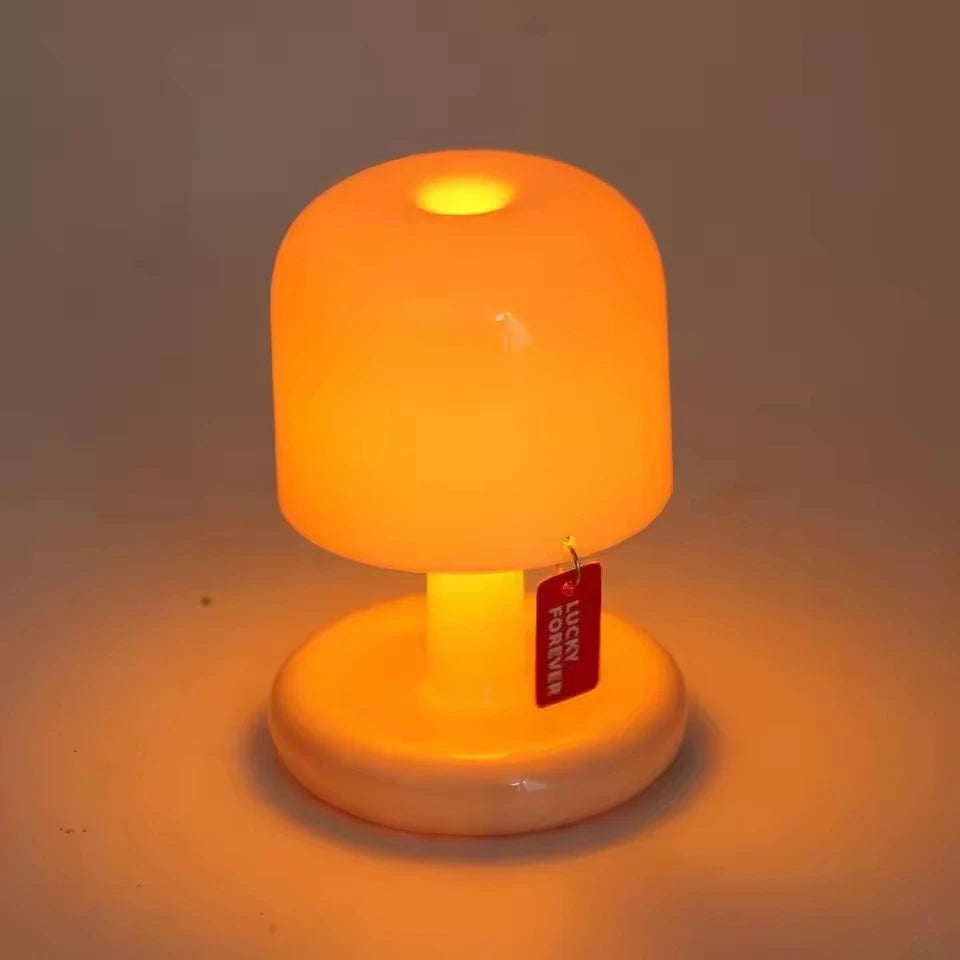 The Dusk Lamp lit with a warm sunset glow