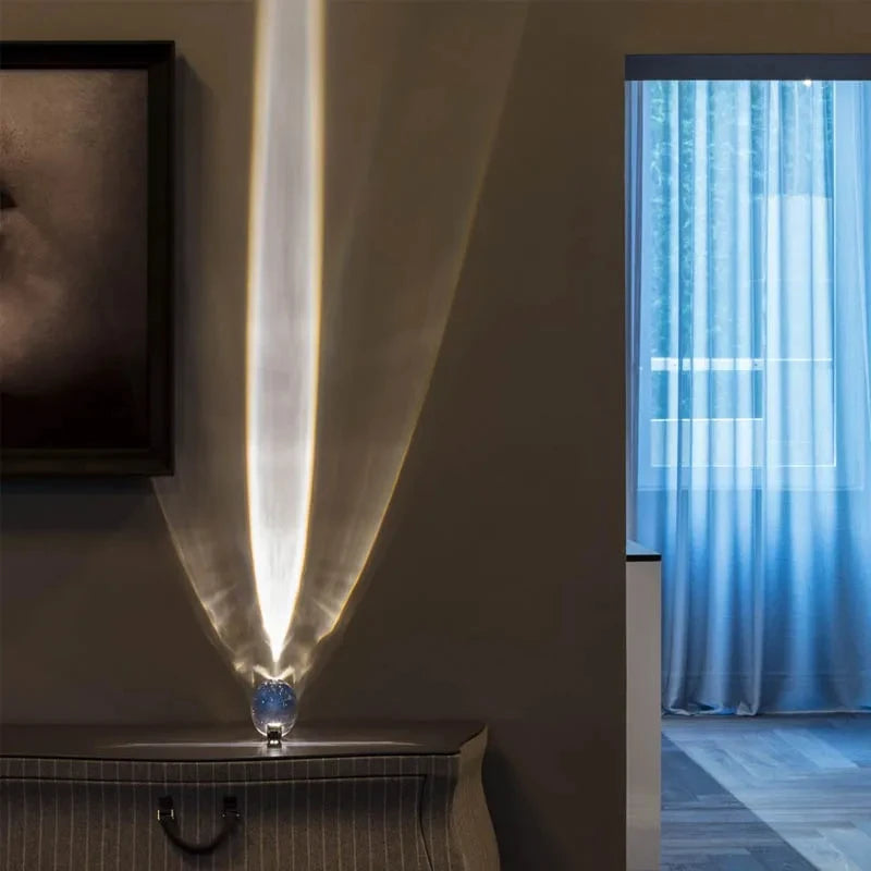 Prism Light projecting a vertical white beam in a living room