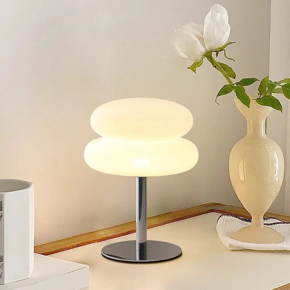The Cloud Lamp beside a vase